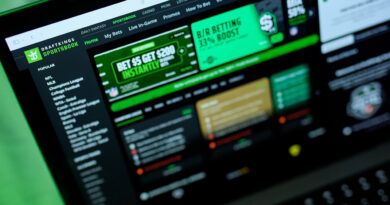 Stocks making the biggest moves premarket: DraftKings, Applied Materials, Roku, Rivian Automotive and more