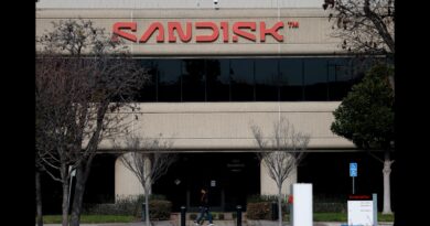 Stocks making the biggest moves midday: Sandisk, Tesla, Lululemon, Quanex, AMC & more